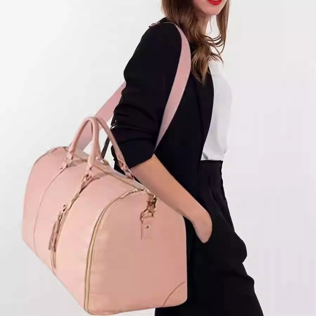 Sac_de_voyage_2_en_1_rose_poudr%C3%A9_GeWjVBA