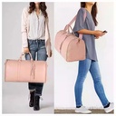 Sac_de_voyage_2_en_1_rose_poudr%C3%A9_Ve16aqx