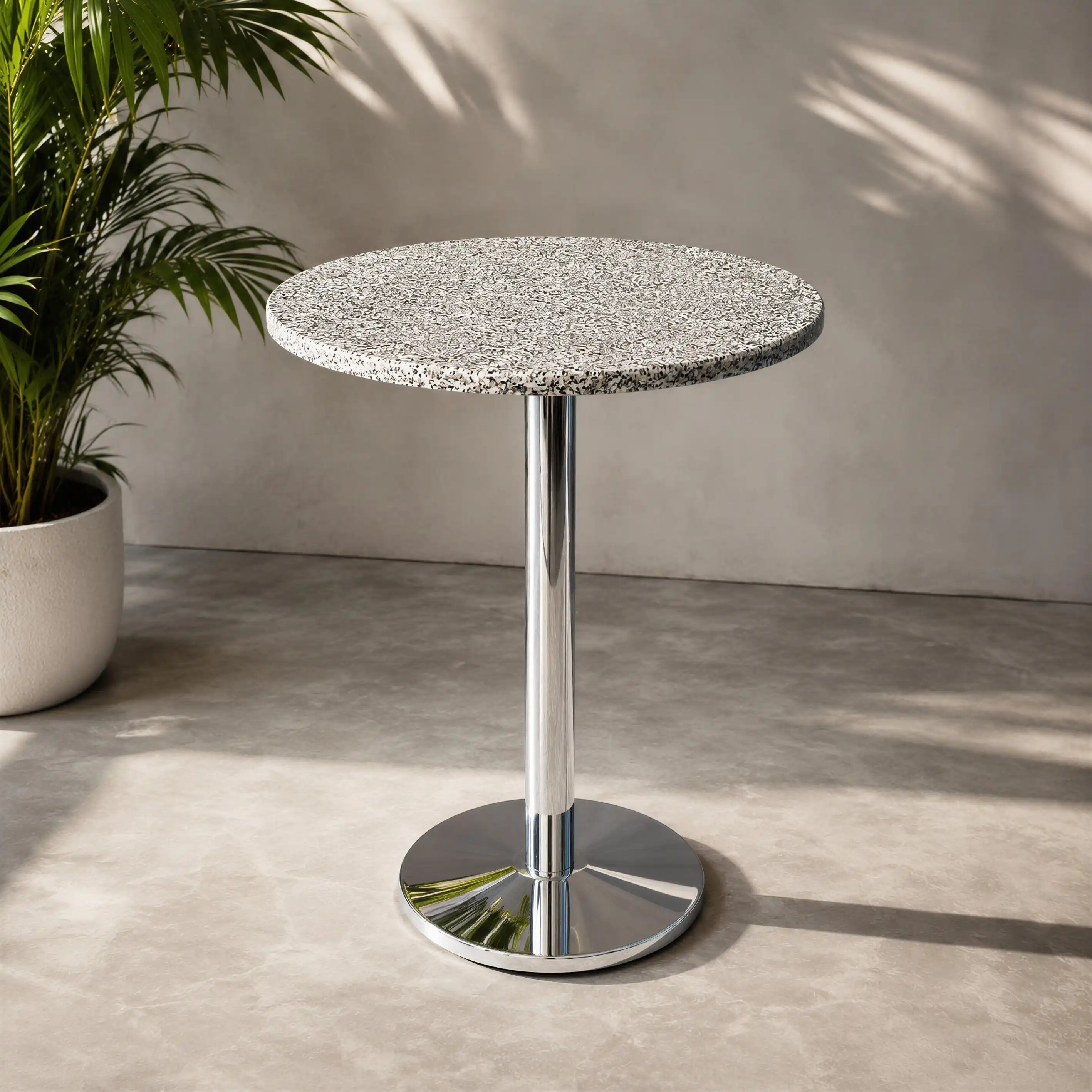 Table_haute_ronde_70110_cm_avec_plateau_effet_terrazzo_shivjV3.webp